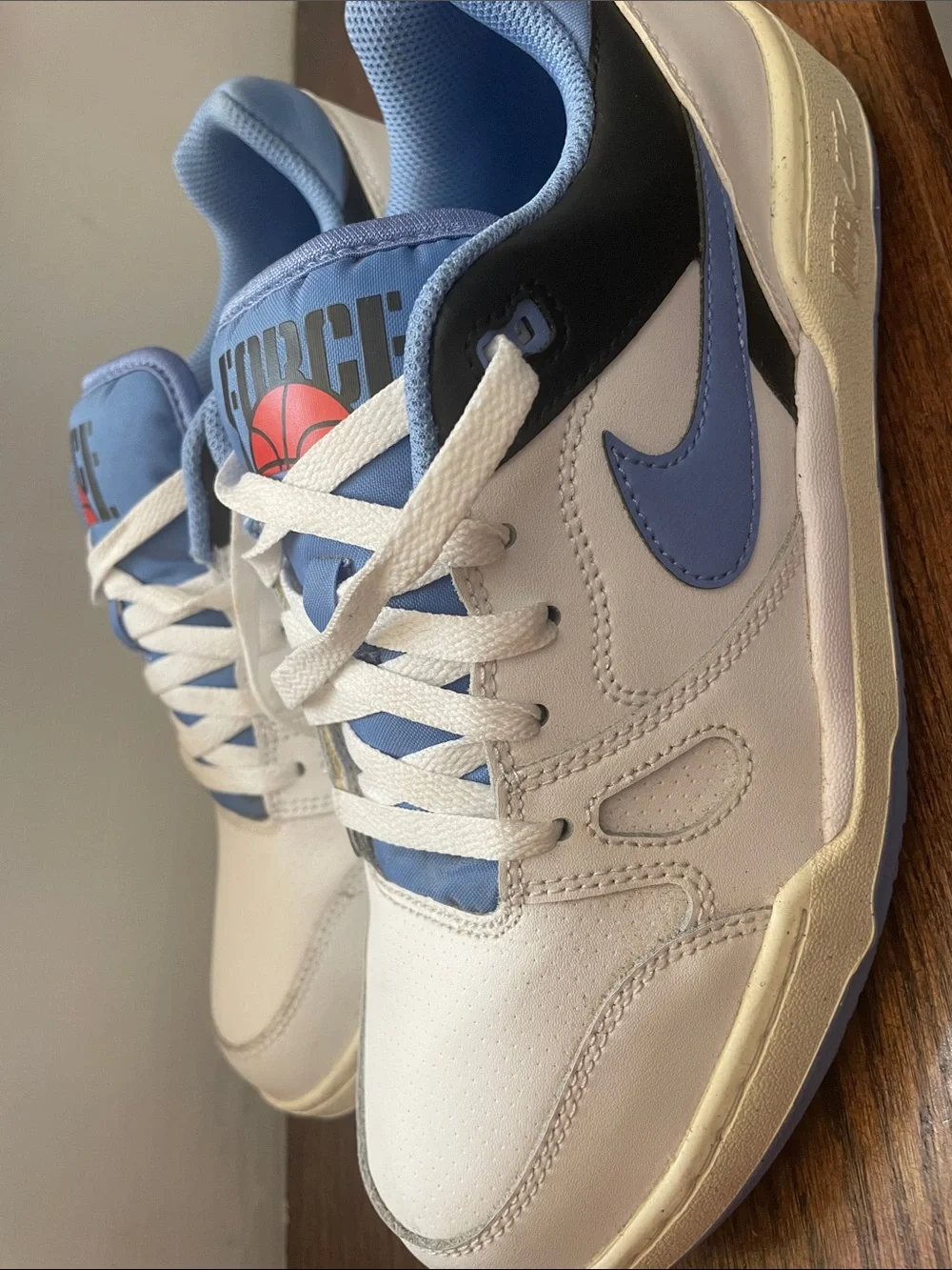Nike White and Light Blue Low-Top Sneakers with Red Logo